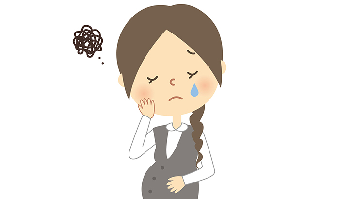 悩む妊婦